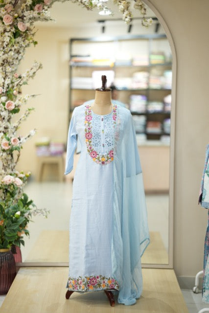 Pastel Blue Cotton Suit Set with Colorful Floral Embroidery & Lace Yoke