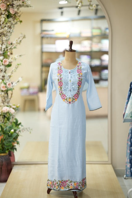 Pastel Blue Cotton Suit Set with Colorful Floral Embroidery & Lace Yoke