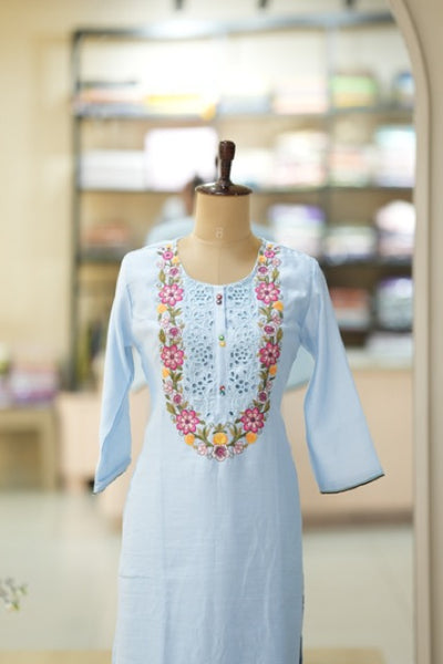 Pastel Blue Cotton Suit Set with Colorful Floral Embroidery & Lace Yoke